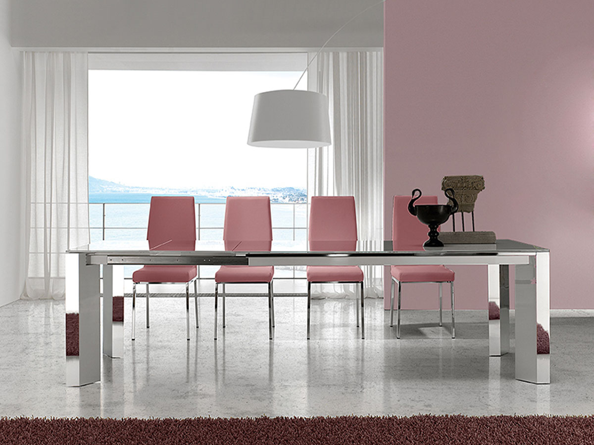 mesa de comedor, elevable y extensible de metal y ceramica. diseño moderno ramiro tarazona.